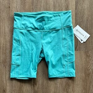 NWT Athleta Ultimate Stash 9" Shorts Turquoise Large Athletic Workout Pockets
